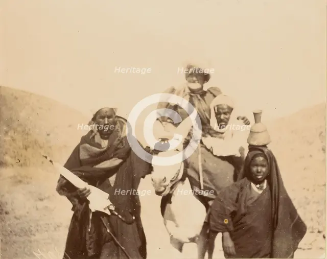 Men with woman riding mule, about 1860-1880. Creator: Unknown.