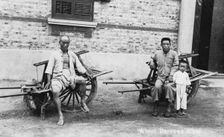 Men with wheelbarrows, Vietnam(?), 20th century