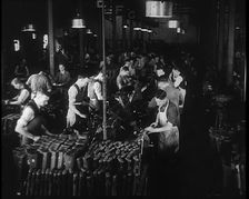 Men Working in a Factory, 1940. Creator: British Pathe Ltd
