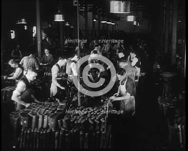 Men Working in a Factory, 1940. Creator: British Pathe Ltd.