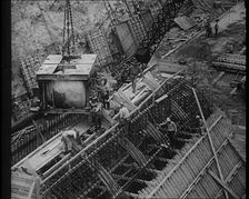 Men Working on a Dam, 1933. Creator: British Pathe Ltd