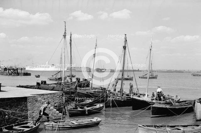 Men working on Bawley boats moored at a quay at Gravesend, c1945-c1965. Artist: SW Rawlings