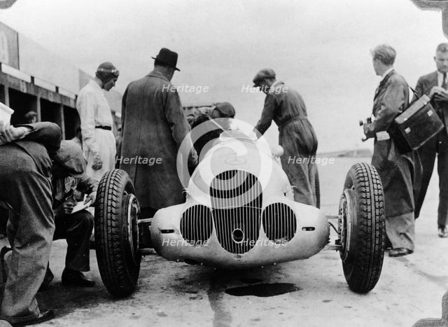 Mercedes-Benz W125 Grand Prix car at the Nurburgring, Germany, 1937. Artist: Unknown