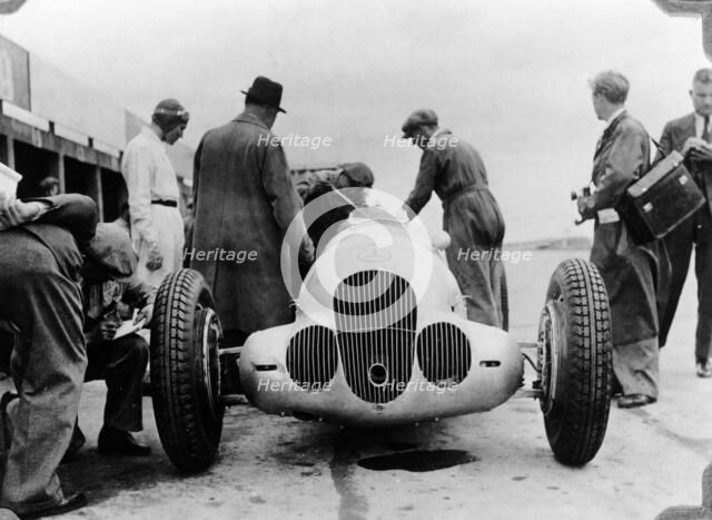 Mercedes-Benz W125 Grand Prix car at the Nurburgring, Germany, 1937. Artist: Unknown