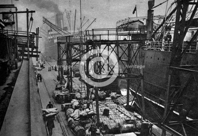 Merchant ships in the Royal Albert Dock, London, 1926-1927. Artist: Unknown