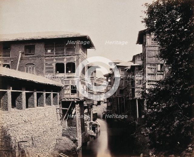 Merchants' houses above the Marqual canal, Kashmir, India, c1860s. Creator: Samuel Bourne.