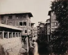Merchants houses above the Marqual canal, Kashmir, India, c1860s. Creator: Samuel Bourne
