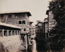 Merchants houses above the Marqual canal, Kashmir, India, c1860s. Creator: Samuel Bourne