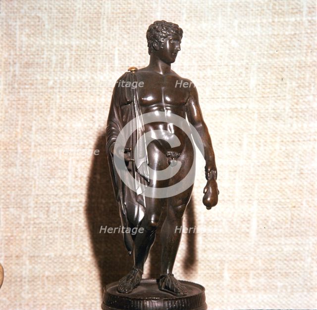 Mercury holding a purse, carrying a traveller's cloak. Roman brronze, 1st century. Artist: Unknown.