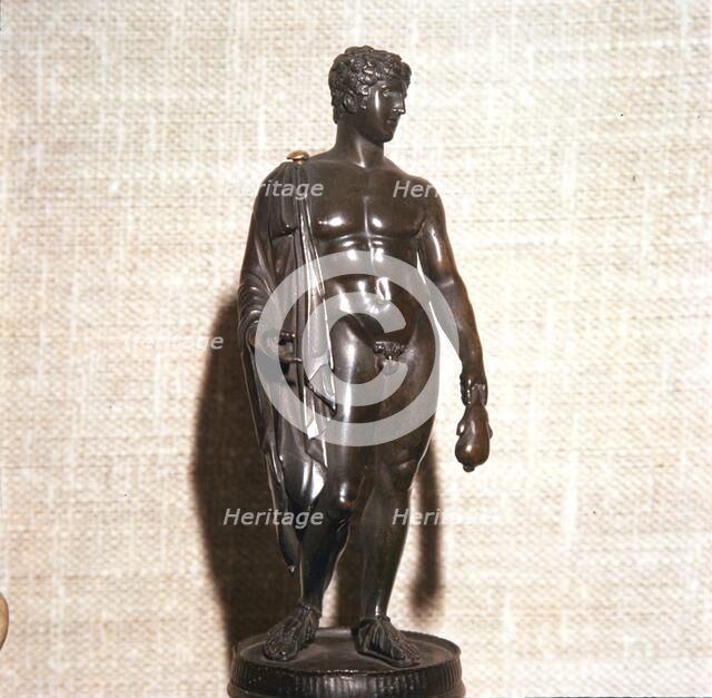 Mercury holding a purse, carrying a traveller's cloak. Roman brronze, 1st century. Artist: Unknown.