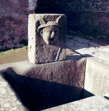 Mercury on a fountain in a street, Pompeii, Italy. Creator: Unknown