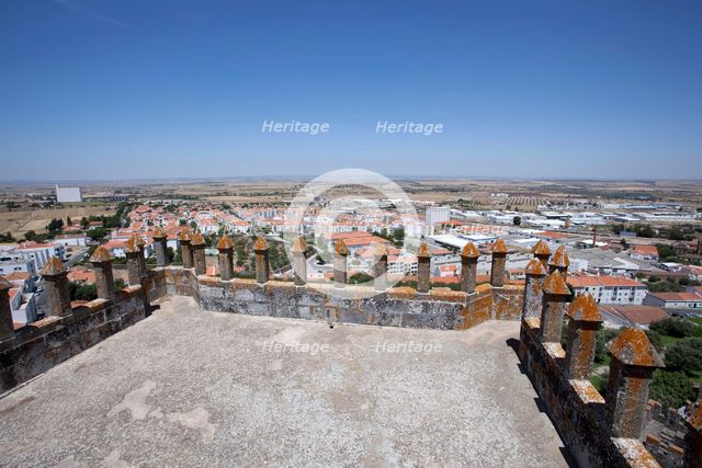 Merlons on the battlements of Beja Castle and view of the city, Beja, Portugal, 2009. Artist: Samuel Magal