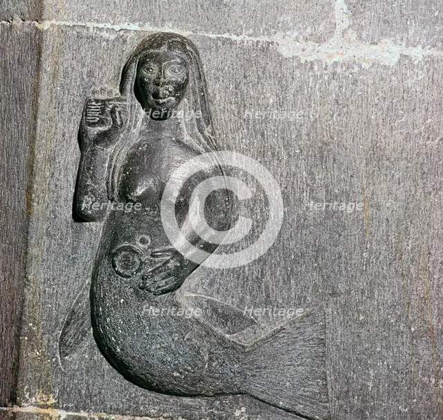 Mermaid on the chancel arch of Clonfert Cathedral, 12th century. Artist: Unknown
