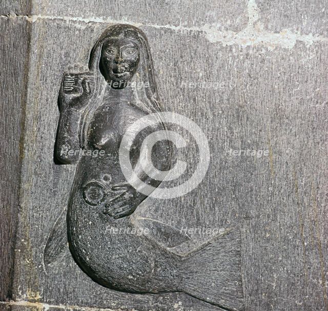 Mermaid on the chancel arch of Clonfert Cathedral, 12th century. Artist: Unknown