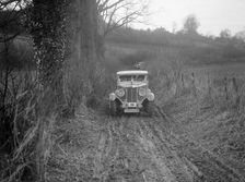 MG 18/80 saloon of R Gough competing in the MG Car Club Trial, Kimble Lane, Chilterns, 1931. Artist: Bill Brunell