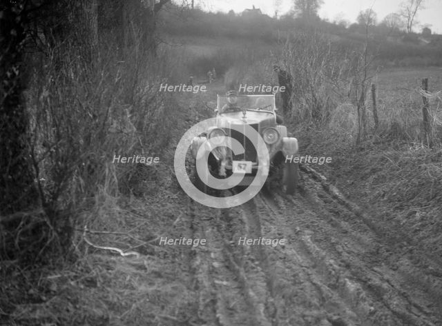 MG 18/80 of D Munro competing in the MG Car Club Trial, Kimble Lane, Chilterns, 1931. Artist: Bill Brunell.