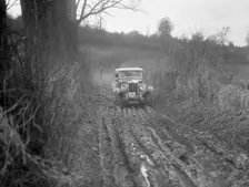 MG 18/80 of N Chichester-Smith competing in the MG Car Club Trial, Kimble Lane, Chilterns, 1931. Artist: Bill Brunell
