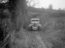 MG 18/80 saloon of R Gough competing in the MG Car Club Trial, Kimble Lane, Chilterns, 1931. Artist: Bill Brunell