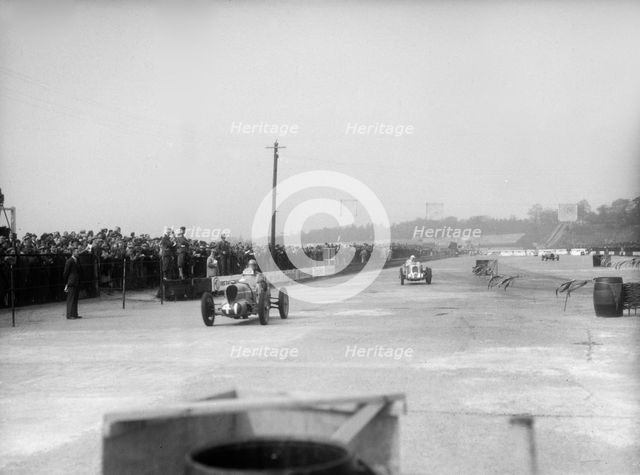 MG cars of Doreen Evans and John Henry Tomson Smith, JCC International Trophy, Brooklands, 1936. Artist: Bill Brunell.