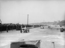 MG cars of Doreen Evans and John Henry Tomson Smith, JCC International Trophy, Brooklands, 1936. Artist: Bill Brunell