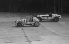 MG and Bowler-Hofman Special competing in the BRDC 500 Mile Race, Brooklands, 1937. Artist: Bill Brunell
