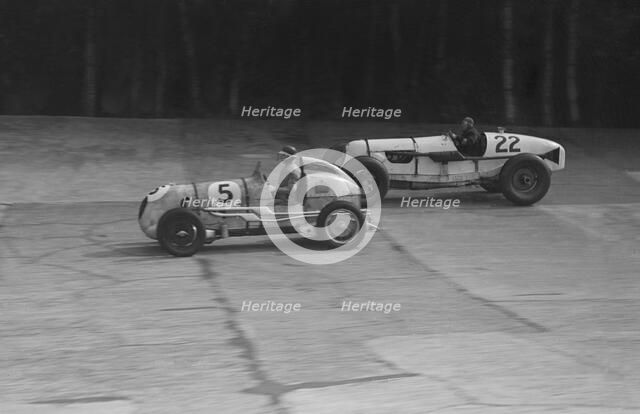 MG and Bowler-Hofman Special competing in the BRDC 500 Mile Race, Brooklands, 1937. Artist: Bill Brunell.