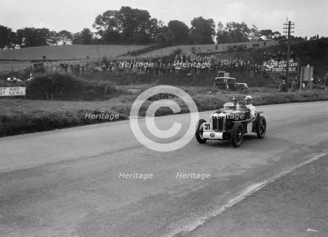 MG C type Midget of Cyril Paul competing in the RAC TT Race, Ards Circuit, Belfast, 1932. Artist: Bill Brunell.