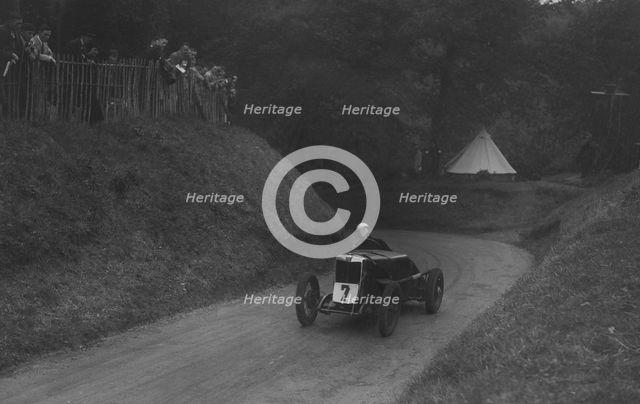 MG C type of Barbara Skinner competing in the Shelsley Walsh Hillclimb, Worcestershire, 1935. Artist: Bill Brunell.