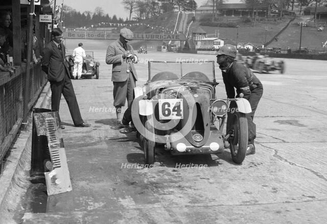 MG C type of FM Montgomery and R Hebeler at the JCC Double Twelve race, Brooklands, 8/9 May 1931. Artist: Bill Brunell.