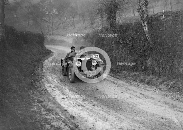 MG C-type of HS Linfield competing in the Inter-Varsity Trial, 1930s. Artist: Bill Brunell.