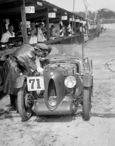 MG C type of Ron Horton and Bill Humphreys in the pits, JCC Double Twelve race, Brooklands, 1931. Artist: Bill Brunell