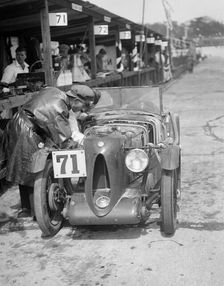 MG C type of Ron Horton and Bill Humphreys in the pits, JCC Double Twelve race, Brooklands, 1931. Artist: Bill Brunell