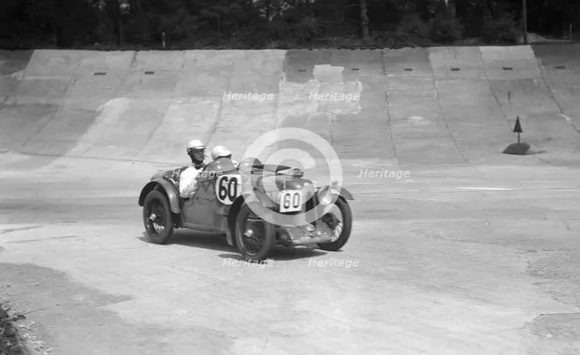 MG C of the Earl of March and CS Staniland, winner of the JCC Double Twelve race, Brooklands, 1931. Artist: Bill Brunell.