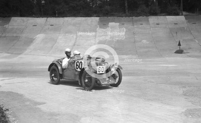 MG C of the Earl of March and CS Staniland, winner of the JCC Double Twelve race, Brooklands, 1931. Artist: Bill Brunell.