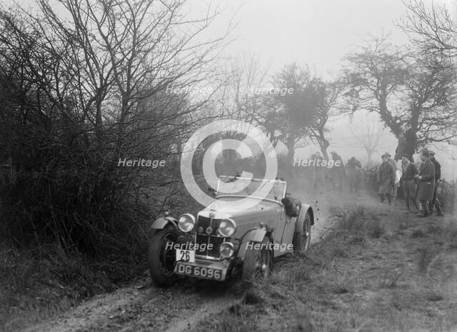 MG F type of GF Horan at the Sunbac Colmore Trial, near Winchcombe, Gloucestershire, 1934. Artist: Bill Brunell.
