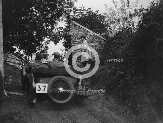 MG F Magna competing in the JCC Lynton Trial, 1932. Artist: Bill Brunell.