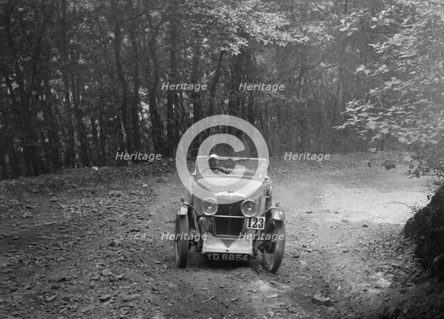 MG J2 competing in the B&HMC Brighton-Beer Trial, Fingle Bridge Hill, Devon, 1934. Artist: Bill Brunell.