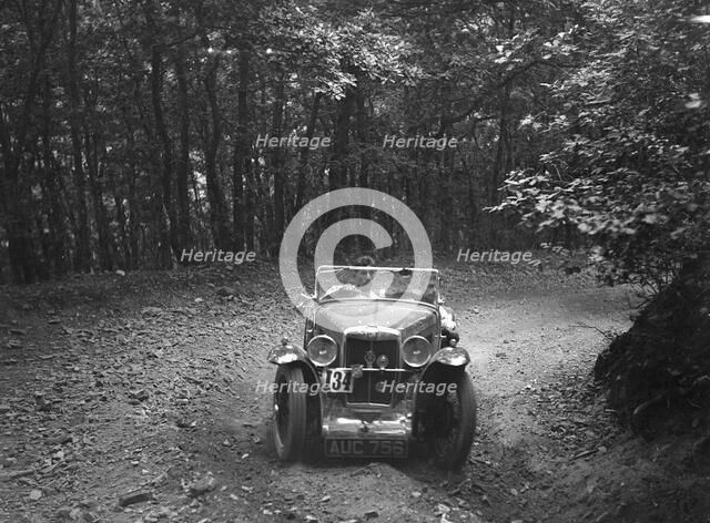 MG J2 competing in the B&HMC Brighton-Beer Trial, Fingle Bridge Hill, Devon, 1934. Artist: Bill Brunell.