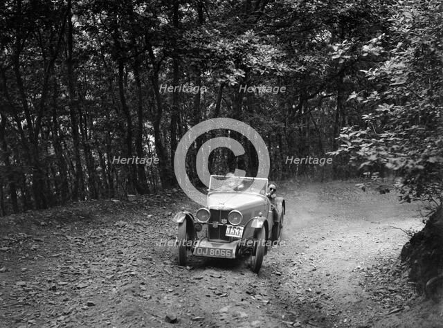 MG J2 competing in the B&HMC Brighton-Beer Trial, Fingle Bridge Hill, Devon, 1934. Artist: Bill Brunell.