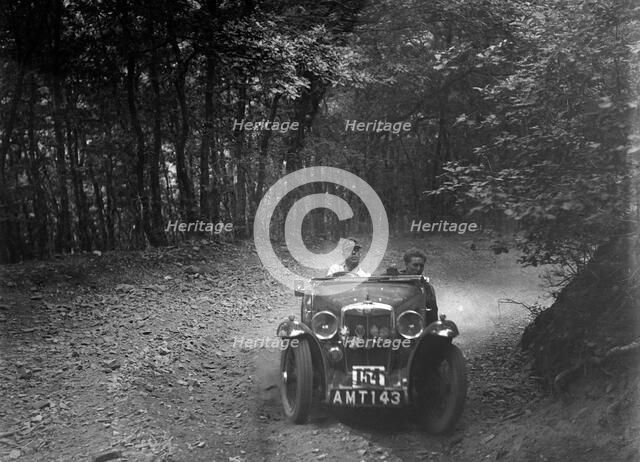 MG J2 competing in the B&HMC Brighton-Beer Trial, Fingle Bridge Hill, Devon, 1934. Artist: Bill Brunell.