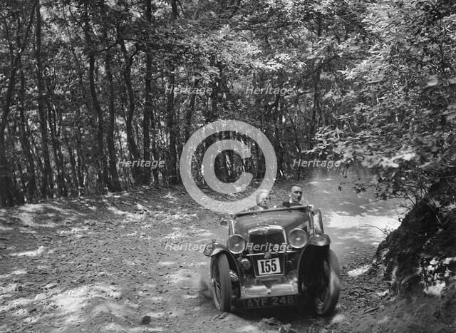 MG J2 competing in the B&HMC Brighton-Beer Trial, Fingle Bridge Hill, Devon, 1934. Artist: Bill Brunell.