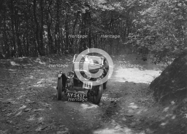 MG J2 competing in the Brighton & Hove Motor Club Brighton-Beer Trial, 1934. Artist: Bill Brunell.