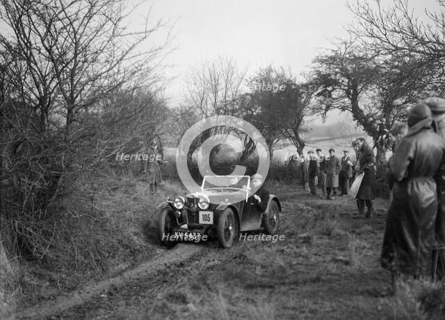 MG J2 of Mrs MM Riley at the Sunbac Colmore Trial, near Winchcombe, Gloucestershire, 1934. Artist: Bill Brunell.