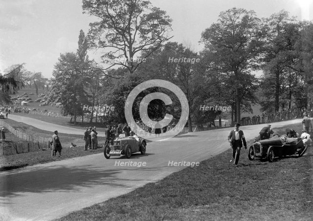 MG J2 passing the crashed Austin 7 of B Sparrow, Donington Park Race Meeting, Leicestershire, 1933. Artist: Bill Brunell.