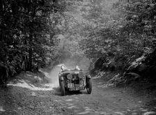 MG J2 taking part in the B&HMC Brighton-Beer Trial, Fingle Bridge Hill, Devon, 1934. Artist: Bill Brunell