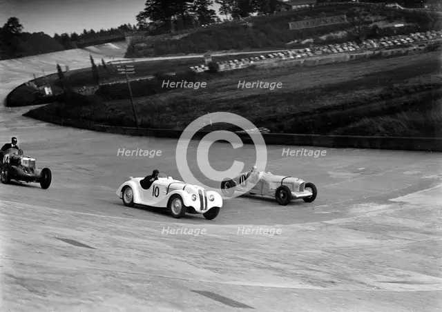 MG K3, Frazer-Nash BMW and Alvis cars racing at Brooklands. Artist: Bill Brunell.