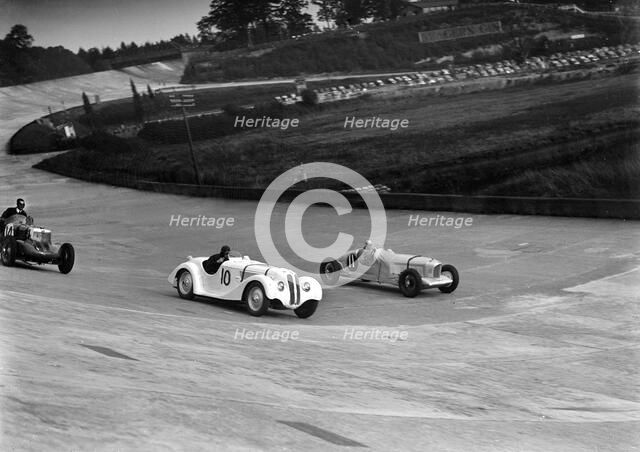 MG K3, Frazer-Nash BMW and Alvis cars racing at Brooklands. Artist: Bill Brunell.