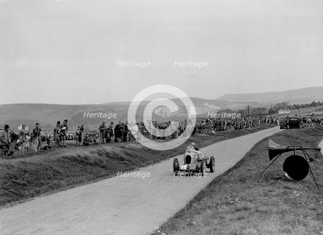 MG of Denis Evans competing at the Lewes Speed Trials, Sussex, 1938. Artist: Bill Brunell.