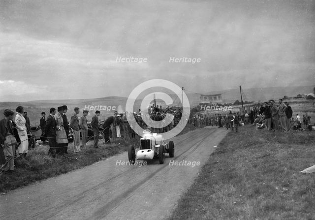 MG of JKW Baines competing in the Bugatti Owners Club Lewes Speed Trials, Sussex, 1937. Artist: Bill Brunell.