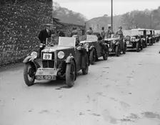 MG M type of EG Farrow at the head of a line of cars competing in the MCC Sporting Trial, 1930. Artist: Bill Brunell